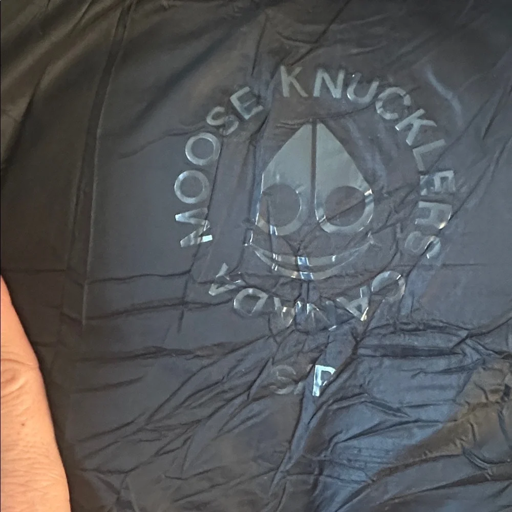 Moose Knuckles black hooded puffer with hologram imprint logo size small